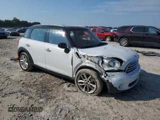 ✅ 2014 MINI Countryman • VIN: WMWZB3C57EWR39948 • Lot: 68753935. Listed on Copart with 146,315 mi. Free auction sales archive from the USA and detailed vehicle history report at DreamBid. Image 4.