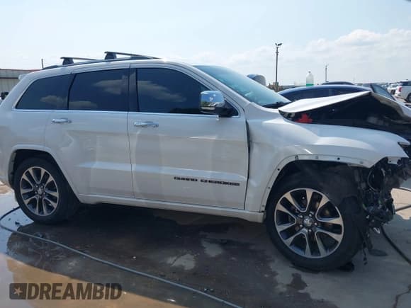 ✅ 2017 Jeep Grand Cherokee Overland • VIN: 1C4RJFCG1HC836961 • Lot: 43054609. Listed on IAAI with 133,975 mi. Free auction sales archive from the USA and detailed vehicle history report at DreamBid. Image 14.