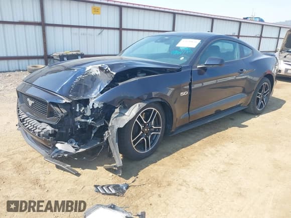 ✅ 2021 Ford Mustang GT • VIN: 1FA6P8CF2M5147469 • Lot: 43120831. Listed on IAAI with 28,250 mi. Free auction sales archive from the USA and detailed vehicle history report at DreamBid. Image 2.