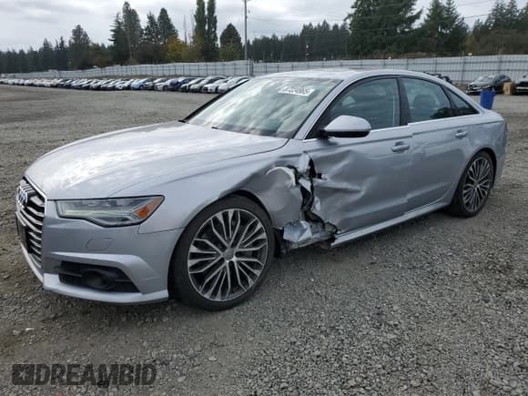 ✅ 2018 Audi A6 Prestige • VIN: WAUH3AFC7JN033192 • Lot: 87224965. Listed on Copart with 118,452 mi. Free auction sales archive from the USA and detailed vehicle history report at DreamBid. Image 1.