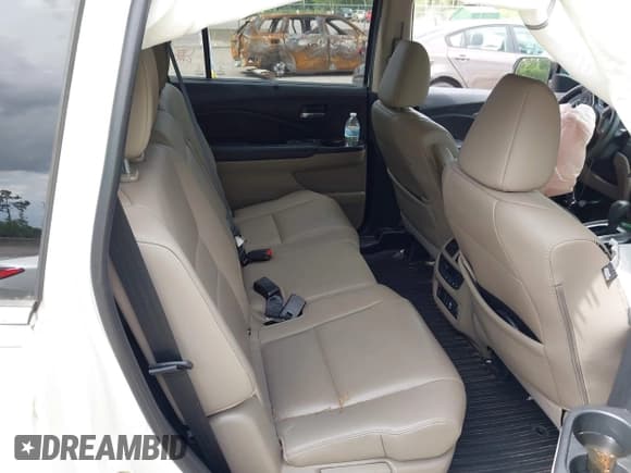 ✅ 2019 Honda Pilot EX-L • VIN: 5FNYF6H49KB067552 • Lot: 42718497. Listed on IAAI with 75,483 mi. Free auction sales archive from the USA and detailed vehicle history report at DreamBid. Image 8.