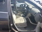 ✅ 2013 Buick Enclave Premium • VIN: 5GAKRDKD8DJ252005 • Lot: 42612187. Listed on IAAI with 192,494 mi. Free auction sales archive from the USA and detailed vehicle history report at DreamBid. Image 5.