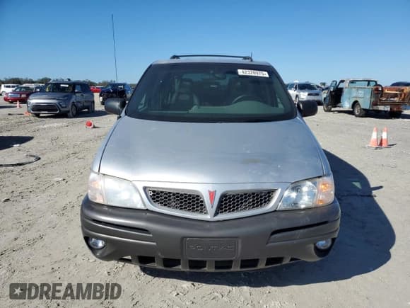 ✅ 2002 Pontiac Montana 1SX • VIN: 1GMDV03E72D193880 • Lot: 42328975. Wystawiony na Copart z przebiegiem 86 980 mil. Bezpłatny archiwum sprzedaży aukcyjnych z USA i szczegółowy raport historii pojazdu na DreamBid. Zdjęcie 5.