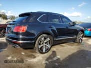 ✅ 2017 Bentley Bentayga W12 • VIN: SJAAC2ZV9HC012780 • Lot: 77242984. Listed on Copart with 28,823 mi. Free auction sales archive from the USA and detailed vehicle history report at DreamBid. Image 3.
