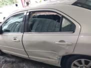 ✅ 2008 Mercury Milan • VIN: 3MEHM07Z38R663276 • Lot: 42468805. Listed on IAAI with 124,173 mi. Free auction sales archive from the USA and detailed vehicle history report at DreamBid. Image 14.