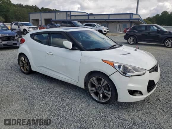 2013 Hyundai Veloster w/Gray Int z VIN KMHTC6AD6DU124843, wystawiony jako Copart lot #73250424 z przebiegiem 113 770 mil mil oraz Czysty tytuł • Clean title. Historia ofert i sprzedaży dostępna na DreamBid. Obrazek 4.