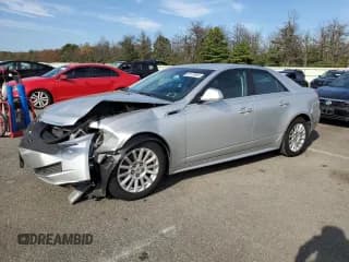 ✅ 2011 Cadillac CTS • VIN: 1G6DA5EY8B0147330 • Lot: 80128965. Listed on Copart with 46,634 mi. Free auction sales archive from the USA and detailed vehicle history report at DreamBid. Image 1.