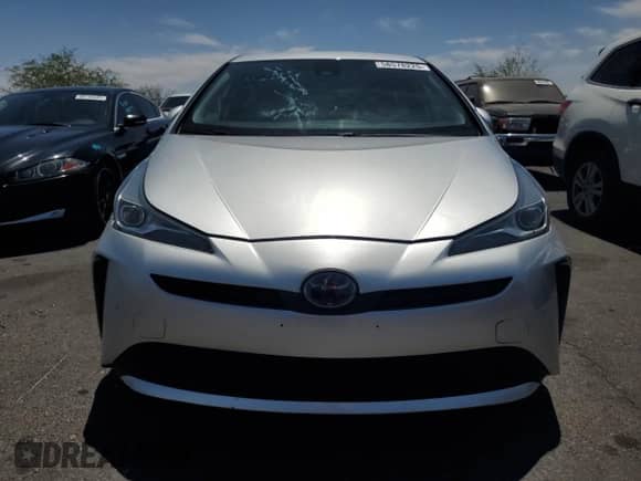 2021 Toyota Prius L Eco with VIN JTDKAMFU3M3148283, listed as a Copart auction lot 58578225 with 89,944 mi miles and Salvage title. Bid and sale history available at DreamBid. Image 5.