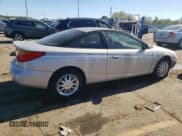 ✅ 2001 Saturn SC • VIN: 1G8ZY14751Z338353 • Лот: 75086154. Опубликован ранее на Copart с пробегом 100 044 миль. Бесплатный доступ к архиву аукционных продаж из США и подробный отчёт об истории автомобиля на DreamBid. Изображение 3.