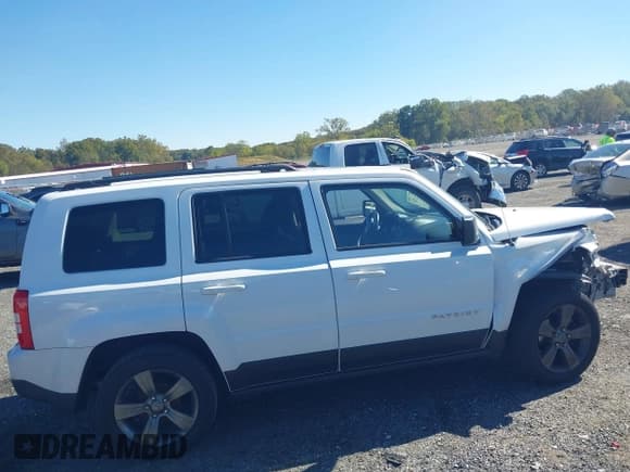 ✅ 2015 Jeep Patriot High Altitude • VIN: 1C4NJPFAXFD157788 • Lot: 43411123. Wystawiony na IAAI z przebiegiem 130 753 mil. Bezpłatny archiwum sprzedaży aukcyjnych z USA i szczegółowy raport historii pojazdu na DreamBid. Zdjęcie 14.