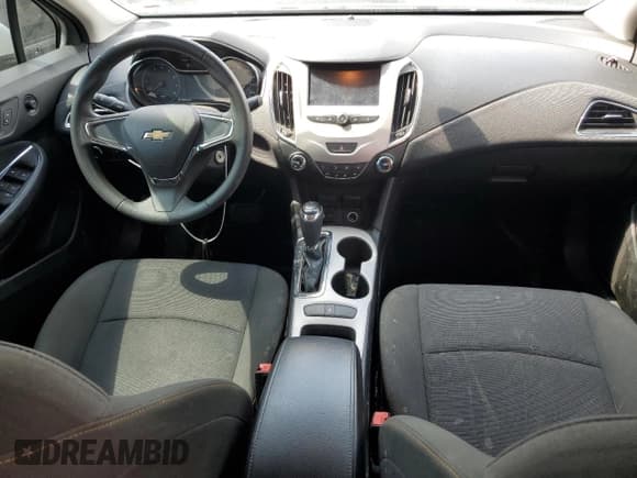 ✅ 2018 Chevrolet Cruze LS • VIN: 1G1BC5SM7J7155580 • Lot: 62201073. Listed on Copart with 85,304 mi. Free auction sales archive from the USA and detailed vehicle history report at DreamBid. Image 8.