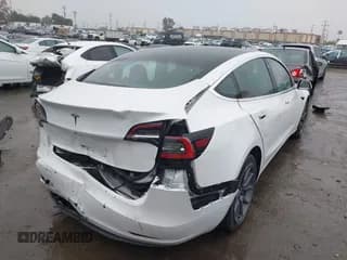 ✅ 2020 Tesla Model 3 Standard Range Plus • VIN: 5YJ3E1EA5LF659834 • Лот: 43770020. Опубликован ранее на IAAI с пробегом 74 578 миль. Бесплатный доступ к архиву аукционных продаж из США и подробный отчёт об истории автомобиля на DreamBid. Изображение 4.