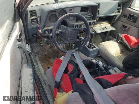 ✅ 1986 Pontiac Sunbird GT • VIN: 1G2JU67J9G7570420 • Лот: 75542874. Опубликован ранее на Copart с пробегом Не указан. Бесплатный доступ к архиву аукционных продаж из США и подробный отчёт об истории автомобиля на DreamBid. Изображение 8.