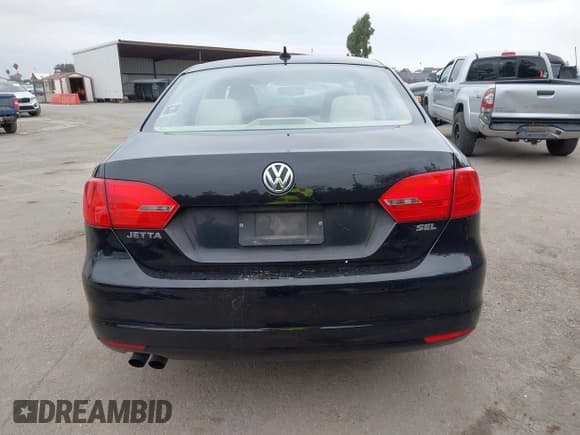 ✅ 2014 Volkswagen Jetta SEL • VIN: 3VWL17AJ7EM387562 • Lot: 43713817. Listed on IAAI with 128,310 mi. Free auction sales archive from the USA and detailed vehicle history report at DreamBid. Image 16.