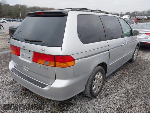 ✅ 2003 Honda Odyssey EX-L • VIN: 5FNRL18033B017812 • Лот: 43830115. Опубликован ранее на IAAI с пробегом 215 588 миль. Бесплатный доступ к архиву аукционных продаж из США и подробный отчёт об истории автомобиля на DreamBid. Изображение 4.