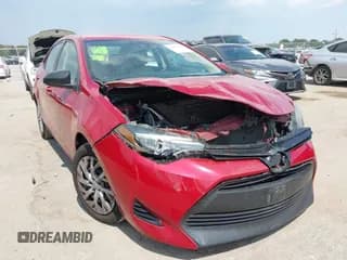 ✅ 2019 Toyota Corolla L • VIN: 5YFBURHEXKP945922 • Lot: 43256740. Listed on IAAI with 112,823 mi. Free auction sales archive from the USA and detailed vehicle history report at DreamBid. Image 1.