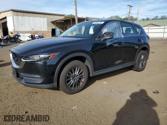 ✅ 2021 Mazda CX-5 Sport • VIN: JM3KFBBMXM0333127 • Lot: 82003745. Wystawiony na Copart z przebiegiem 90 946 mil. Bezpłatny archiwum sprzedaży aukcyjnych z USA i szczegółowy raport historii pojazdu na DreamBid. Zdjęcie 1.