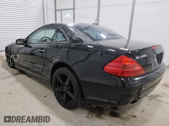 ✅ 2003 Mercedes-Benz SL 500 • VIN: WDBSK75F03F007670 • Lot: 92673275. Listed on Copart with 81,361 mi. Free auction sales archive from the USA and detailed vehicle history report at DreamBid. Image 2.