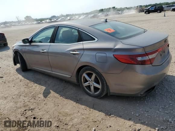2013 Hyundai Azera z VIN KMHFG4JG4DA217863, wystawiony jako Copart lot #53840575 z przebiegiem Nie podano mil oraz Czysty tytuł • Clean title. Historia ofert i sprzedaży dostępna na DreamBid. Obrazek 2.
