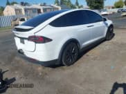 ✅ 2022 Tesla Model X • VIN: 7SAXCAE54NF362277 • Lot: 43643635. Wystawiony na IAAI z przebiegiem 53 073 mil. Bezpłatny archiwum sprzedaży aukcyjnych z USA i szczegółowy raport historii pojazdu na DreamBid. Zdjęcie 4.