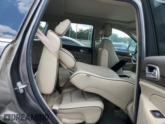 ✅ 2014 Jeep Grand Cherokee Overland • VIN: 1C4RJFCG5EC453360 • Lot: 69995045. Listed on Copart with 84,382 mi. Free auction sales archive from the USA and detailed vehicle history report at DreamBid. Image 11.