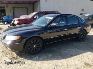 2010 Hyundai Azera Limited z VIN KMHFC4DF7AA450601, wystawiony jako Copart lot #77440654 z przebiegiem 208 867 mil mil oraz Szkoda całkowita • Salvage title. Historia ofert i sprzedaży dostępna na DreamBid. Obrazek 1.