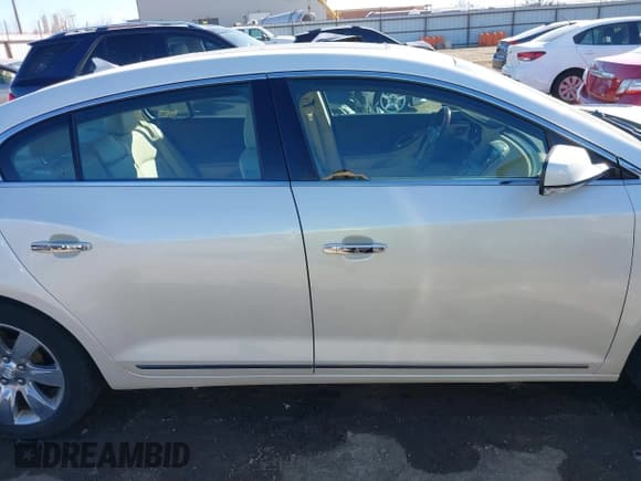 ✅ 2013 Buick LaCrosse Premium 2 • VIN: 1G4GH5G33DF322473 • Лот: 41686787. Опубликован ранее на IAAI с пробегом 206 634 миль. Бесплатный доступ к архиву аукционных продаж из США и подробный отчёт об истории автомобиля на DreamBid. Изображение 13.