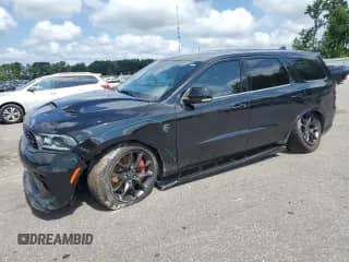 2023 Dodge Durango SRT Hellcat с VIN 1C4SDJH96PC694997, выставлен на аукционе Copart как лот 64183375 с пробегом 8 290 миль миль и Списание • Salvage title. История ставок и продаж доступна на DreamBid. Изображение 1.