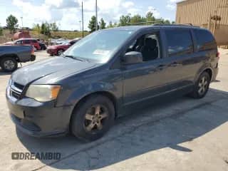 2012 Dodge Grand Caravan SXT z VIN 2C4RDGCG2CR264666, wystawiony jako Copart lot #81803935 z przebiegiem 204 945 mil mil oraz Czysty tytuł • Clean title. Historia ofert i sprzedaży dostępna na DreamBid. Obrazek 1.
