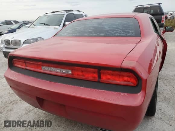 2012 Dodge Challenger SXT z VIN 2C3CDYAG9CH210824, wystawiony jako Copart lot #76201764 z przebiegiem 97 698 mil mil oraz Nie do naprawy • Non repairable. Historia ofert i sprzedaży dostępna na DreamBid. Obrazek 6.