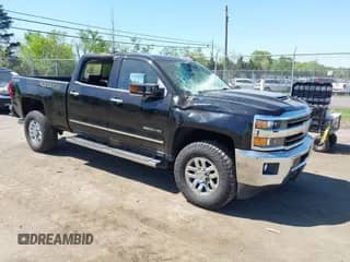 2018 Chevrolet Silverado 2500HD LTZ с VIN 1GC1KWEY7JF123065, выставлен на аукционе IAAI как лот 42135775 с пробегом 61 504 миль миль и . История ставок и продаж доступна на DreamBid. Изображение 1.