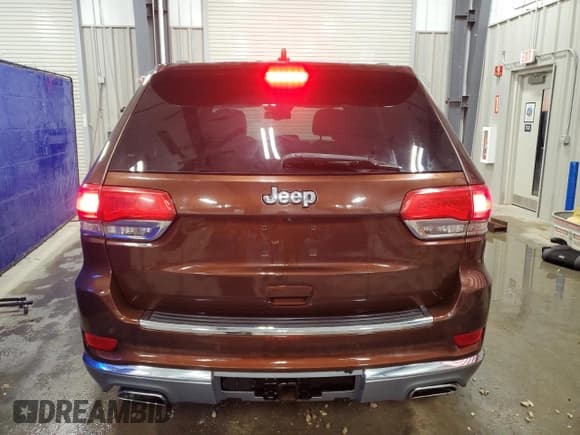 ✅ 2014 Jeep Grand Cherokee Summit • VIN: 1C4RJFJT6EC276110 • Lot: 90085555. Listed on Copart with 266,904 mi. Free auction sales archive from the USA and detailed vehicle history report at DreamBid. Image 6.