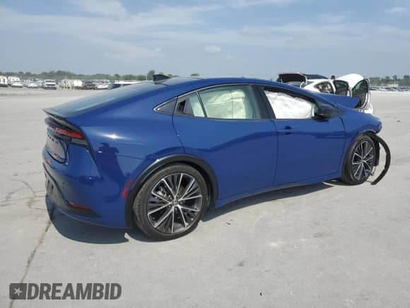 2023 Toyota Prius LE with VIN JTDADABU8P3006684, listed as a Copart auction lot 63282995 with 31,885 mi miles and Salvage title. Bid and sale history available at DreamBid. Image 3.