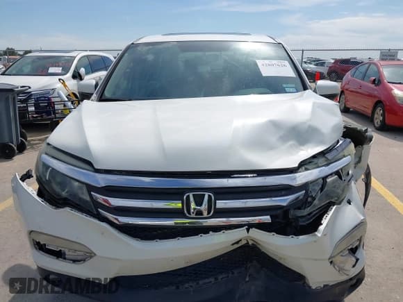 ✅ 2018 Honda Pilot EX-L • VIN: 5FNYF5H51JB000297 • Лот: 42807626. Опубликован ранее на IAAI с пробегом 103 380 миль. Бесплатный доступ к архиву аукционных продаж из США и подробный отчёт об истории автомобиля на DreamBid. Изображение 13.