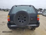 ✅ 1998 Isuzu Rodeo S • VIN: 4S2CK58W5W4369312 • Lot: 87681205. Listed on Copart with 187,951 mi. Free auction sales archive from the USA and detailed vehicle history report at DreamBid. Image 6.