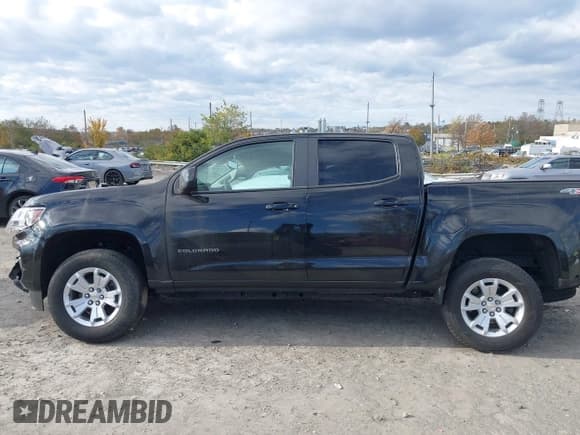 ✅ 2021 Chevrolet Colorado 4WD LT • VIN: 1GCGTCEN9M1263583 • Лот: 43584465. Опубликован ранее на IAAI с пробегом 22 810 миль. Бесплатный доступ к архиву аукционных продаж из США и подробный отчёт об истории автомобиля на DreamBid. Изображение 14.