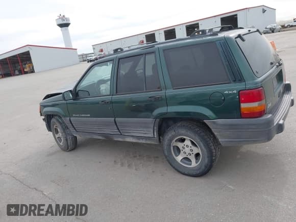 ✅ 1997 Jeep Grand Cherokee Laredo • VIN: 1J4GZ58SXVC569641 • Lot: 43626465. Listed on IAAI with 170,882 mi. Free auction sales archive from the USA and detailed vehicle history report at DreamBid. Image 15.