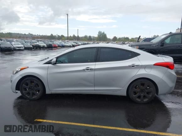 ✅ 2012 Hyundai Elantra Limited • VIN: KMHDH4AE9CU243620 • Lot: 43335926. Listed on IAAI with 229,499 mi. Free auction sales archive from the USA and detailed vehicle history report at DreamBid. Image 14.