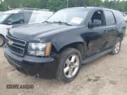 ✅ 2014 Chevrolet Tahoe LT • VIN: 1GNSCBE04ER141927 • Lot: 42651845. Listed on IAAI with 89,980 mi. Free auction sales archive from the USA and detailed vehicle history report at DreamBid. Image 6.