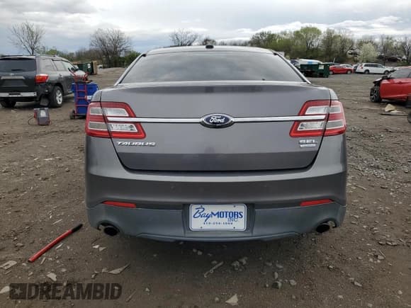 ✅ 2014 Ford Taurus SEL • VIN: 1FAHP2E98EG173853 • Lot: 51698915. Wystawiony na Copart z przebiegiem 128 322 mil. Bezpłatny archiwum sprzedaży aukcyjnych z USA i szczegółowy raport historii pojazdu na DreamBid. Zdjęcie 6.