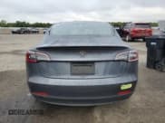 ✅ 2023 Tesla Model 3 • VIN: 5YJ3E1EA3PF409451 • Lot: 80679695. Wystawiony na Copart z przebiegiem 25 938 mil. Bezpłatny archiwum sprzedaży aukcyjnych z USA i szczegółowy raport historii pojazdu na DreamBid. Zdjęcie 6.