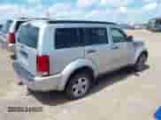 2008 Dodge Nitro SLT z VIN 1D8GT58KX8W100870, wystawiony jako IAAI lot #42520804 z przebiegiem 167 043 mil mil oraz . Historia ofert i sprzedaży dostępna na DreamBid. Obrazek 4.