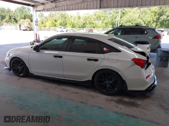 ✅ 2022 Honda Civic Si • VIN: 2HGFE1E5XNH473494 • Lot: 42863243. Listed on IAAI with 34,489 mi. Free auction sales archive from the USA and detailed vehicle history report at DreamBid. Image 14.