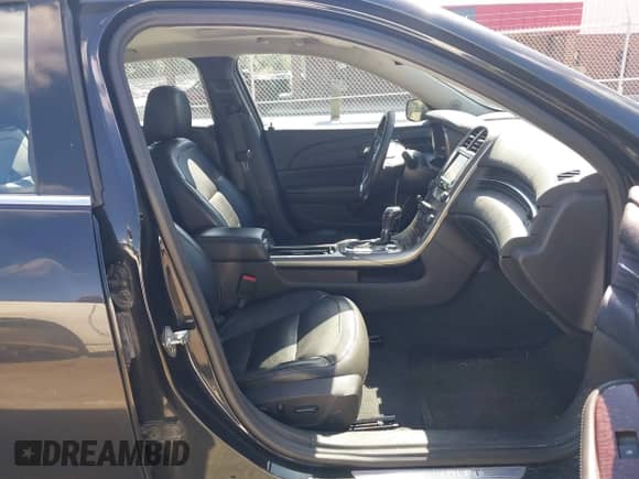 2013 Chevrolet Malibu LTZ with VIN 1G11J5SX8DF181563, listed as a IAAI auction lot 43352896 with 108,348 mi miles and . Bid and sale history available at DreamBid. Image 5.