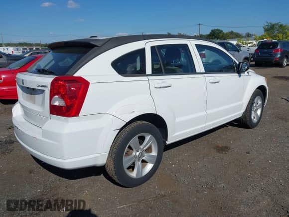 2012 Dodge Caliber SXT with VIN 1C3CDWDA4CD536636, listed as a IAAI auction lot 43225609 with 69,066 mi miles and . Bid and sale history available at DreamBid. Image 4.