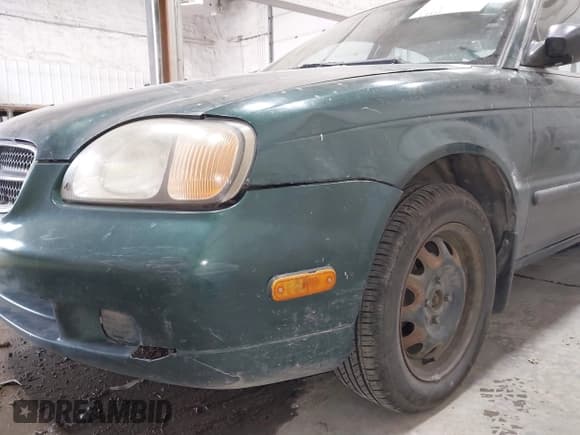 ✅ 1999 Suzuki Esteem • VIN: JS2GB31S2X5162466 • Lot: 42326400. Listed on IAAI with 144,492 mi. Free auction sales archive from the USA and detailed vehicle history report at DreamBid. Image 6.