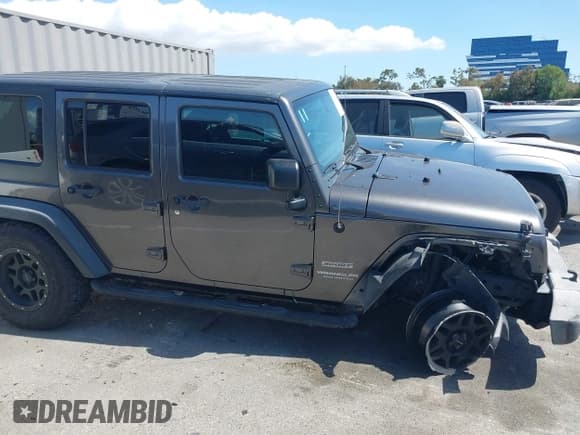 ✅ 2016 Jeep Wrangler Unlimited Sport • VIN: 1C4BJWDG7GL229364 • Lot: 42239069. Wystawiony na IAAI z przebiegiem 87 001 mil. Bezpłatny archiwum sprzedaży aukcyjnych z USA i szczegółowy raport historii pojazdu na DreamBid. Zdjęcie 13.