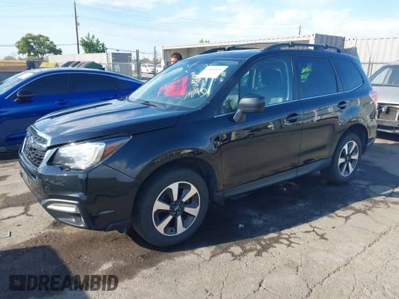 2017 Subaru Forester Limited with VIN JF2SJARC0HH803155, listed as a IAAI auction lot 43085830 with 101,984 mi miles and . Bid and sale history available at DreamBid. Image 2.