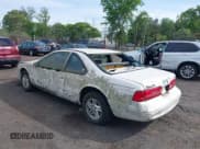 ✅ 1997 Ford Thunderbird LX • VIN: 1FALP6246VH126650 • Лот: 42219698. Опубликован ранее на IAAI с пробегом 69 880 миль. Бесплатный доступ к архиву аукционных продаж из США и подробный отчёт об истории автомобиля на DreamBid. Изображение 3.