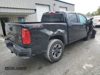 ✅ 2022 Chevrolet Colorado 4WD Z71 • VIN: 1GCGTDEN4N1308565 • Лот: 69489393. Опубликован ранее на Copart с пробегом 7 448 миль. Бесплатный доступ к архиву аукционных продаж из США и подробный отчёт об истории автомобиля на DreamBid. Изображение 3.